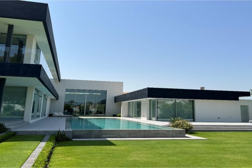 Two storey luxury villa with swimming pool and landscaped lawn in Quraya, Bahrain